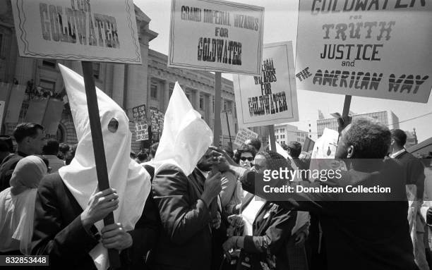 Ku Klux Klan members supporting Barry Goldwater's campaign for the presidential nomination at the Republican National Convention on July 12, 1964 in...