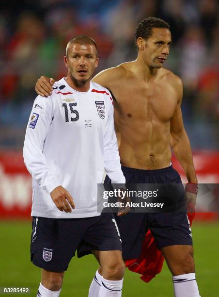 David Beckham and Rio Ferdinand of England walk off the pitch after victory over Belarus in the FIFA2010 World Cup group six Qualifying match between...