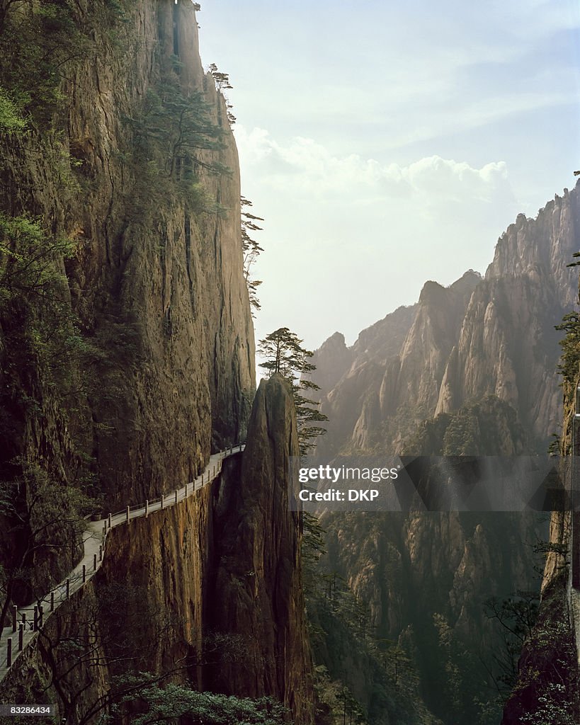 Pathway winding through Chinese mountian landscape