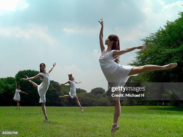 the plural same people do a ballet dance in a park - multiple images of the same woman stock pictures, royalty-free photos & images