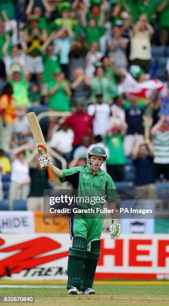Irish batsman Niall O'Brien celebrates a half century as Ireland take on Pakistan in the second match of the ICC Cricket World Cup 2007, Group C...
