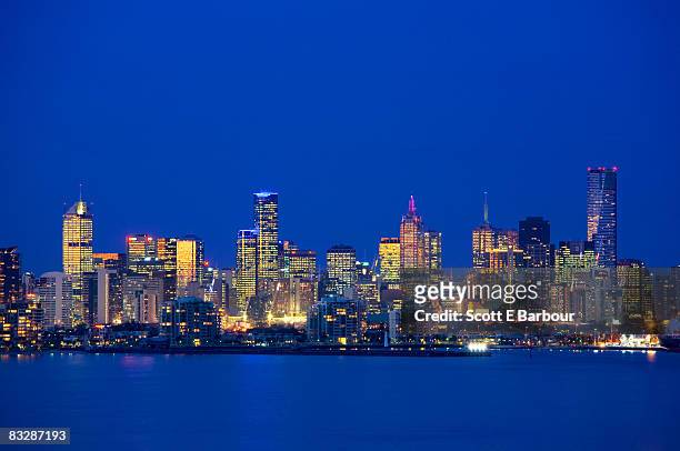 view across port phillip bay, melbourne skyline - melbourne skyline stock pictures, royalty-free photos & images