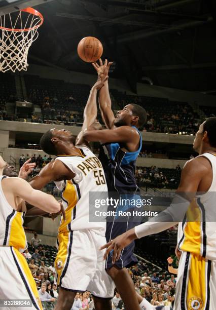 Shawne Williams of the Dallas Mavericks shoots over Roy Hibbert of the Indiana Pacers at Conseco Fieldhouse on October 15, 2008 in Indianapolis,...