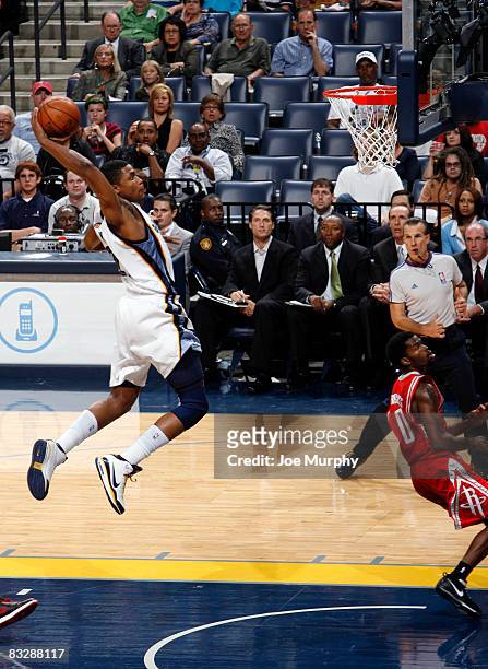 Rudy Gay of the Memphis Grizzlies dunks against the Houston Rockets on October 15, 2008 at the FedExForum in Memphis, Tennessee. NOTE TO USER: User...