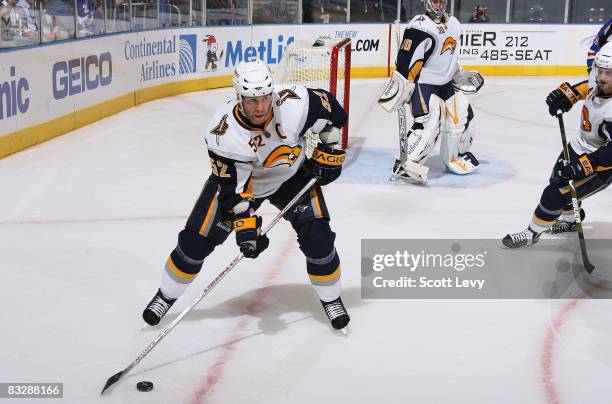 Craig Rivet of the Buffalo Sabres controls the puck while playing against the New York Rangers on October 15, 2008 at Madison Square Garden in New...