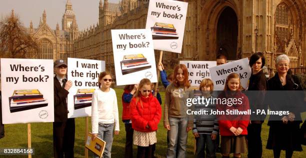 Children's writer Jacqueline Wilson outside Parliament with blind and partially sighted children who were lobbying for the right to read today.