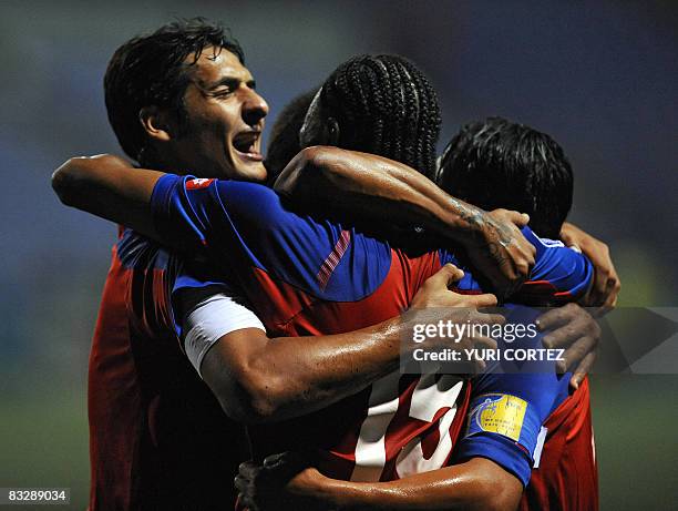 Costa Rica's Junior Diaz celebrates with his teammates Celso Borges and Walter Centeno after scoring a goal against Haiti during their FIFA World Cup...