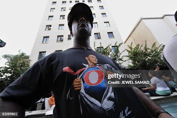 Supporter of presidential candidate Barack Obama arrives to watch the televised final presidential debate between Democrat Barack Obama and...