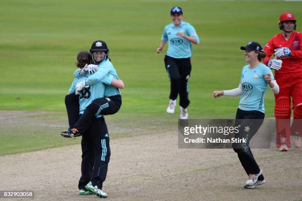 Tammy Beaumont hugs Rene Farrell of Surrey Stars after they win the Kia Super League 2017 match between Lancashire Thunder and Surrey Stars at Old...