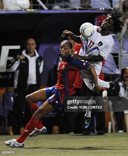 Costa Rican's Junior Diaz vies for the ball with Leonel Saint Preux from Haiti during the FIFA World Cup South Africa-2010 qualifying football match...