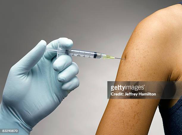 person receiving a vaccine - two people studio shot stock pictures, royalty-free photos & images