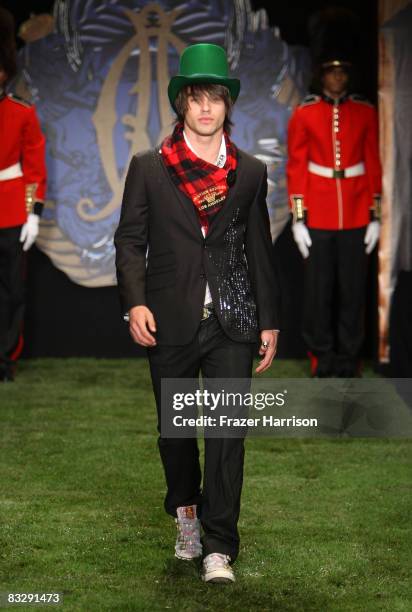 Model Justin Gaston walks the runway at the Christian Audigier Presents American Lord Spring 2009 fashion show during Mercedes-Benz Fashion Week held...