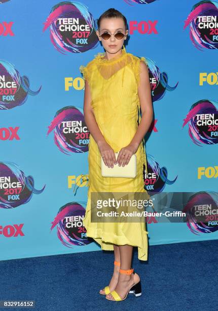 Actress Millie Bobby Brown arrives at the Teen Choice Awards 2017 at Galen Center on August 13, 2017 in Los Angeles, California.