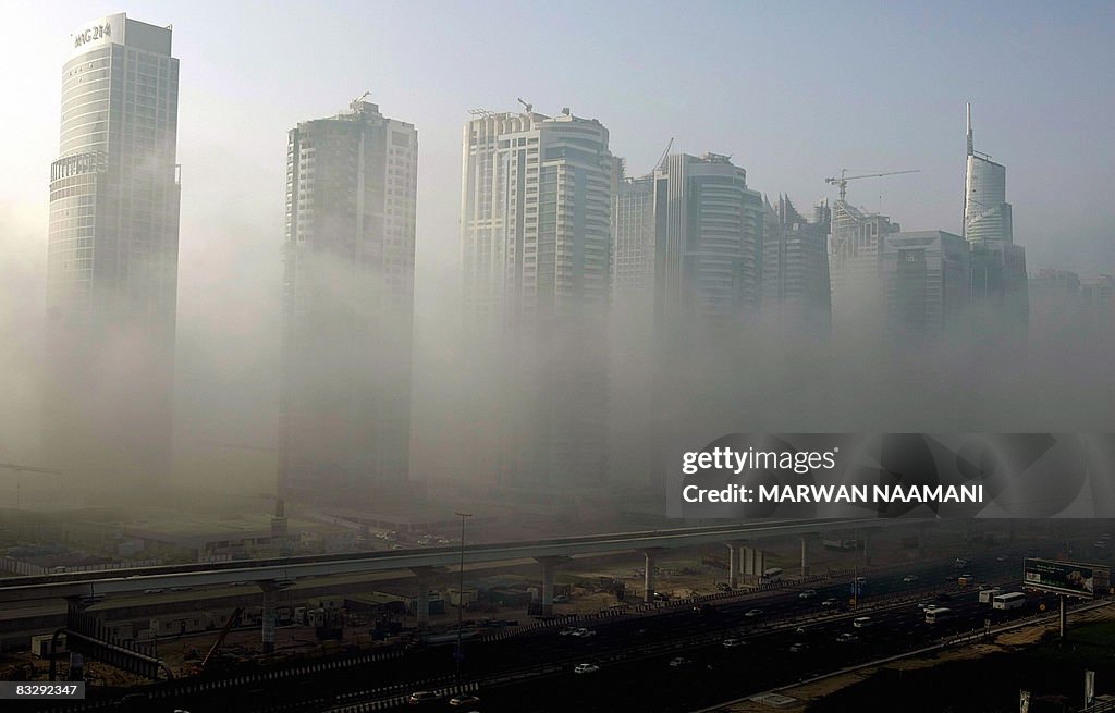 Morning fog engulfs Sheikh Zayed road in