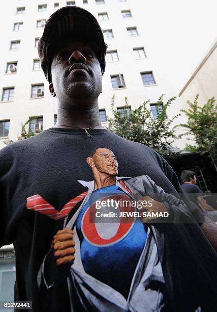 Supporter of presidential candidate Barack Obama arrives to watch the televised final presidential debate between Democrat Barack Obama and...