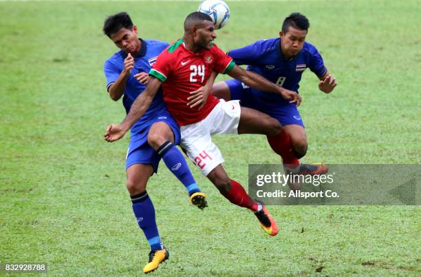 Marinus Mariyanto of Indonesia battles for the ball during the Men Football Group B preliminary round match between Indonesia and Thailand at the...