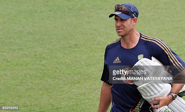 Australian cricketer Matthew Hayden takes part in a training session at The Punjab Cricket Association Stadium in Mohali on October 16, 2008....