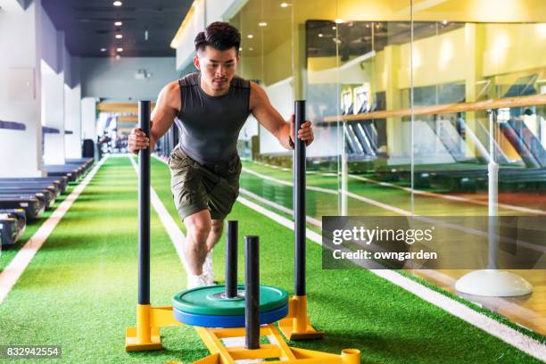 young man practicing gym - circuit training stock pictures, royalty-free photos & images