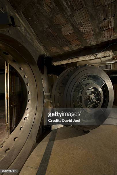 wide panoramic view of vintage bank vault - rehabbing stock pictures, royalty-free photos & images