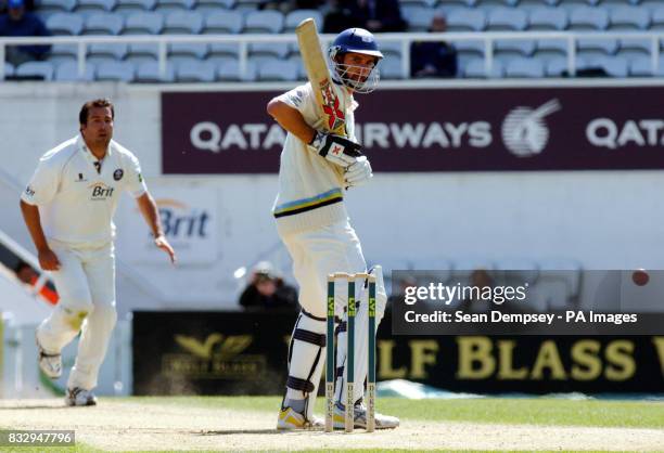 Yorkshire batsman Jason Gillespie hits off Surrey bowler James Ormond during the Liverpool Victoria County Championship match at The Brit Oval,...