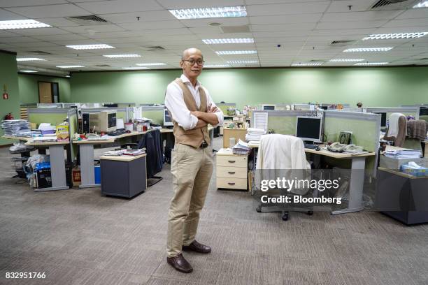 Lim Tze Cheng, chief executive officer of Inter-Pacific Asset Management Sdn., poses for a portrait in his office in Kuala Lumpur, Malaysia, on...