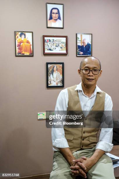 Lim Tze Cheng, chief executive officer of Inter-Pacific Asset Management Sdn., poses for a portrait in his office in Kuala Lumpur, Malaysia, on...