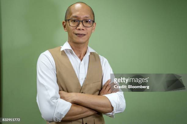 Lim Tze Cheng, chief executive officer of Inter-Pacific Asset Management Sdn., poses for a portrait in his office in Kuala Lumpur, Malaysia, on...