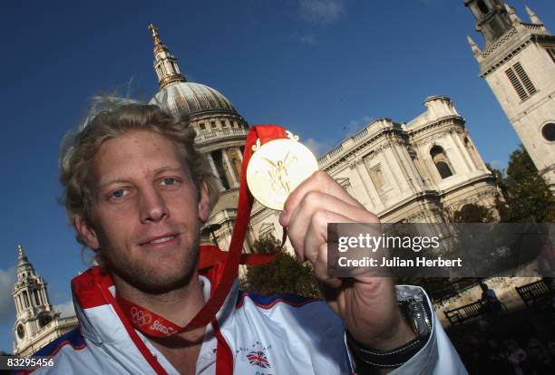 Andy Hodge of The GB Rowing Four displays his Gold Medal during The Olympic and Paralympic Heroes Parade, October 16, 2008 in London, England.