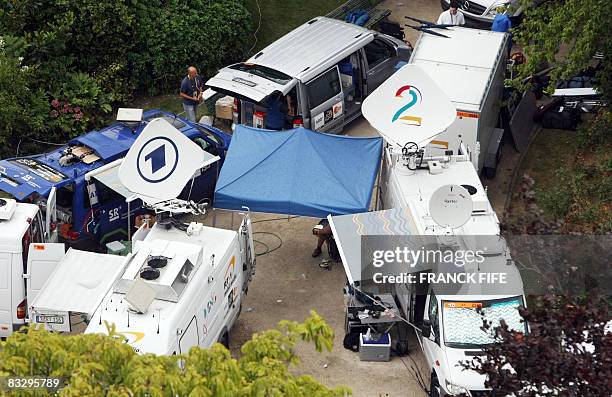 Aerial view on July 29, 2007 shows German television stations ARD and Denmark's TV2 Sporten vehicles parked in the TV and media broadcasting area of...