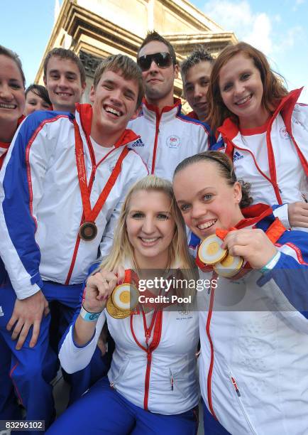 Double Gold medalists Rebecca Adlington and Eleanor Simmonds display their medals on the float alongside fellow Team GB Olympic and Paralympic...