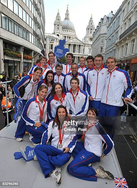 The Team GB Olympic and Paralympic swimming team pose for a photograph on the float during Britain's Olympic medal winners parade on October 16, 2008...