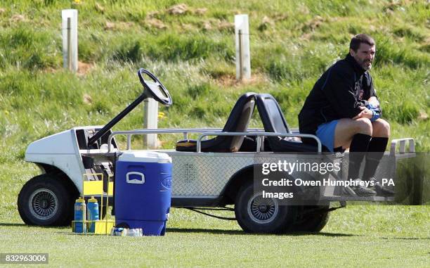 Sunderland manager Roy Keane watches his squad during a training session at Whitburn, Sunderland.