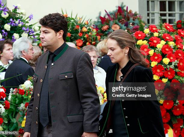 Ulrike Haider, daughter of Austrian far-right leader Joerg Haider and her husband Paolo Quercia attend the mouring service at the Landhaus Klagenfurt...