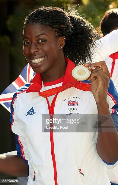 British Olympic 400m gold medalist, Christine Ohuruogu poses with her medal during the Olympic and Paralympic Heroes Parade on October 15, 2008 in...