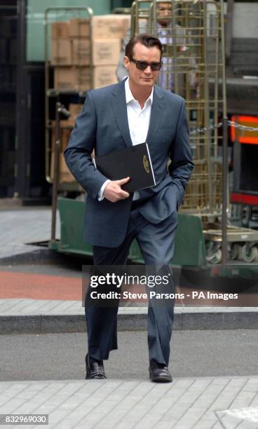 Tamara Mellon's ex-husband US banking heir Matthew Mellon arrives at Southwark Crown Court.