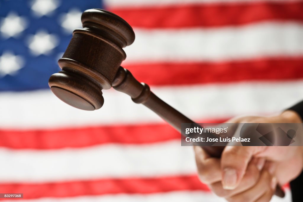 Judge's gravel with American Flag in background
