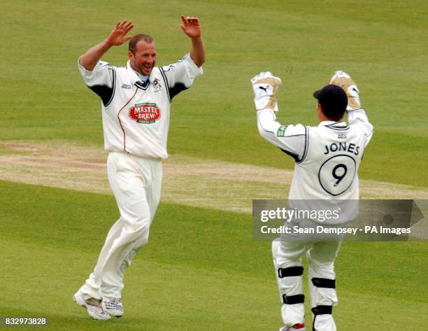 Kent's Darren Stevens celebrates with wicketkeeper Geraint Jones the wicket off Matthew Prior during the Liverpool Victoria County Championship...