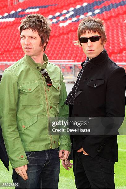 Noel Gallagher and Liam Galllagher attend the Oasis photocall in Wembley Stadium to promote their new album 'Dig out Your Soul' released on October...
