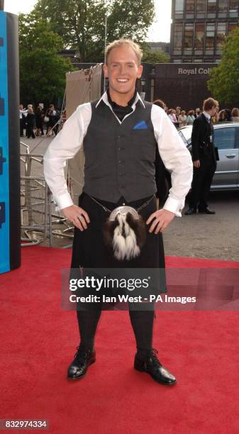 Scottish tenor Nicky Spence arrives for the Classical Brit Awards at the Royal Albert Hall in central London.