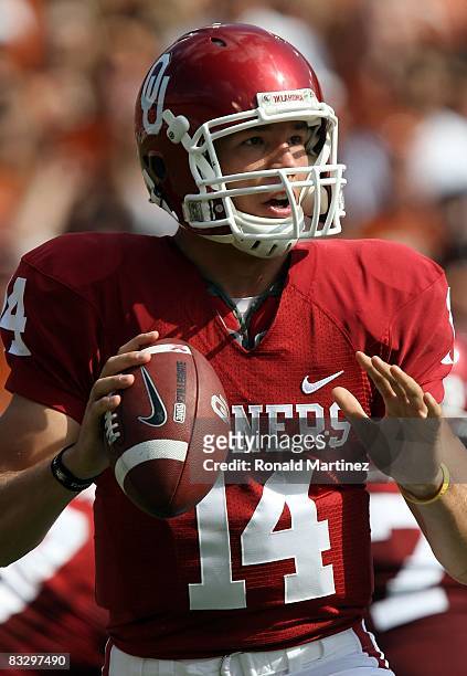 Quarterback Sam Bradford of the Oklahoma Sooners during play against the Texas Longhorns during the Red River Rivalry at the Cotton Bowl on October...