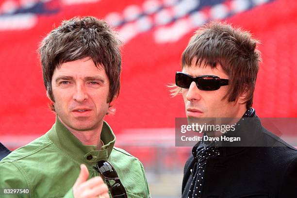 Noel and Liam Gallagher attend the Oasis photocall in Wembley Stadium to promote their new album 'Dig out Your Soul' released on October 6, and their...