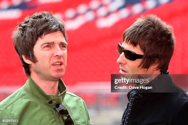 Noel and Liam Gallagher attend the Oasis photocall in Wembley Stadium to promote their new album 'Dig out Your Soul' released on October 6, and their...