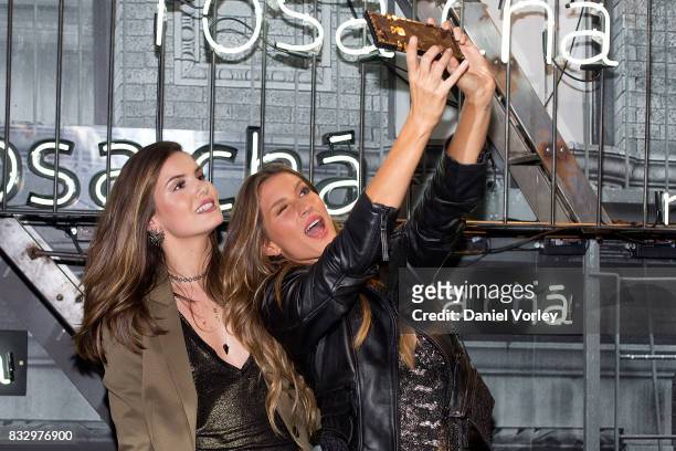 Gisele Bundchen and Camila Queiroz attend Rosa Cha presents Gisele Bundchen on August 16, 2017 in Sao Paulo, Brazil.