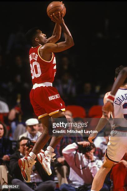 Kenny Smith of the Houston Rockets takes a jump shot during a NBA basketball game against the Washington Bullets on January 13, 1994 at USAir Arena...