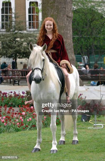 Phoebe Thomas in a photocall for her new film Lady Godiva in Soho Square, central London.