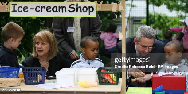 Ashleigh Price, age 4, Beverley Hughes, Minister for Children and Families, Ducale Hussain Burallea, age 4, Ivan Lewis, Minister for Care Services,...