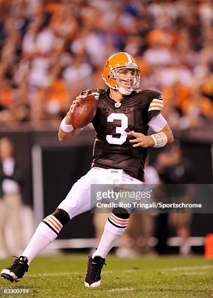 Derek Anderson of the Cleveland Browns drops back to pass against the New York Giants at Cleveland Stadium on October 13, 2008 in Cleveland, Ohio....