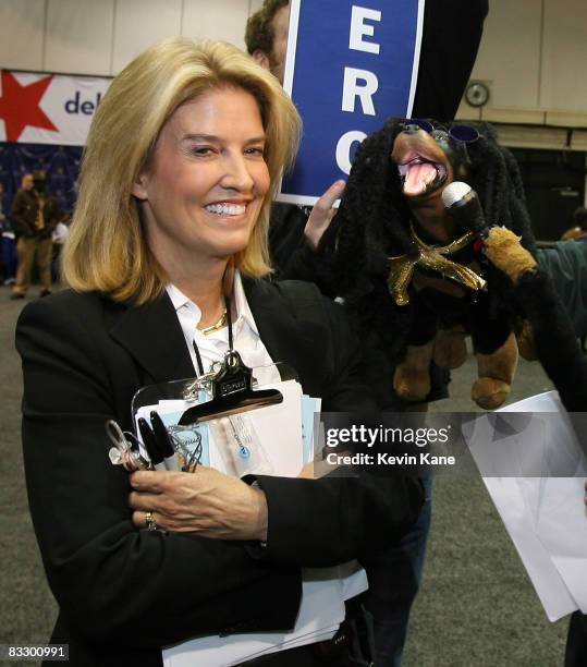 Fox News correspondent, Greta Van Susteren gets interviewed by Triumph the comic insult dog, inside the media center during the third 2008...