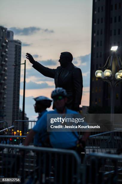 Police officers guard a statue of former Philadelphia mayor Frank Rizzo as protesters march against white supremacy August 16, 2017 in downtown...