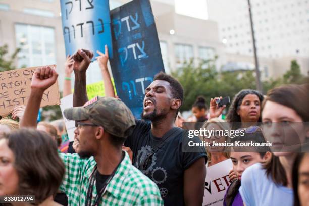 Demonstrators participate in a march and rally against white supremacy August 16, 2017 in downtown Philadelphia, Pennsylvania. Demonstrations are...